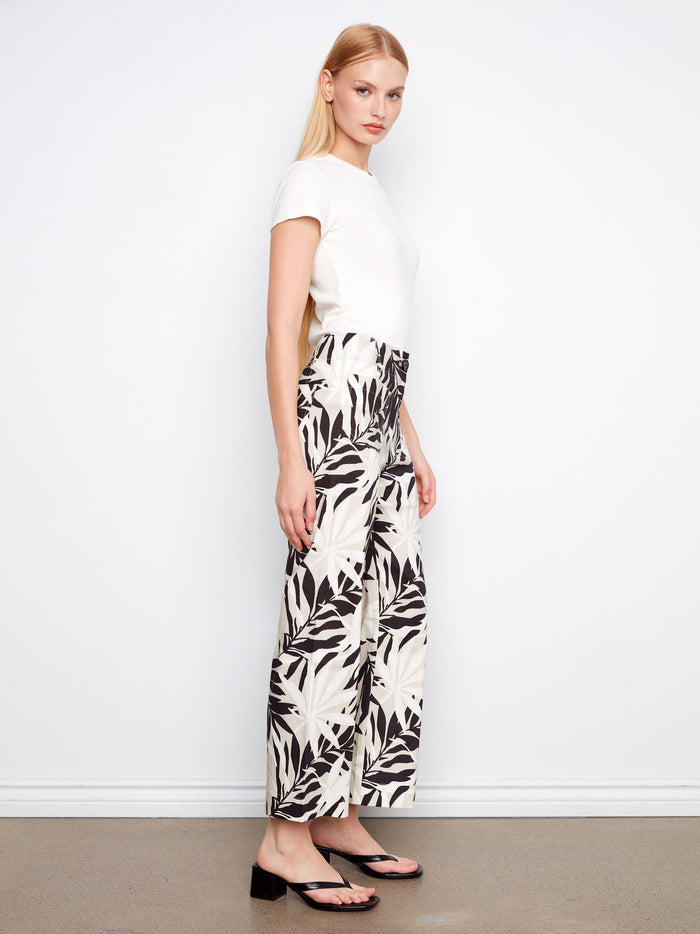 Black and white leaf print pants with regular rise and stylish patch pockets by Charlie B.
