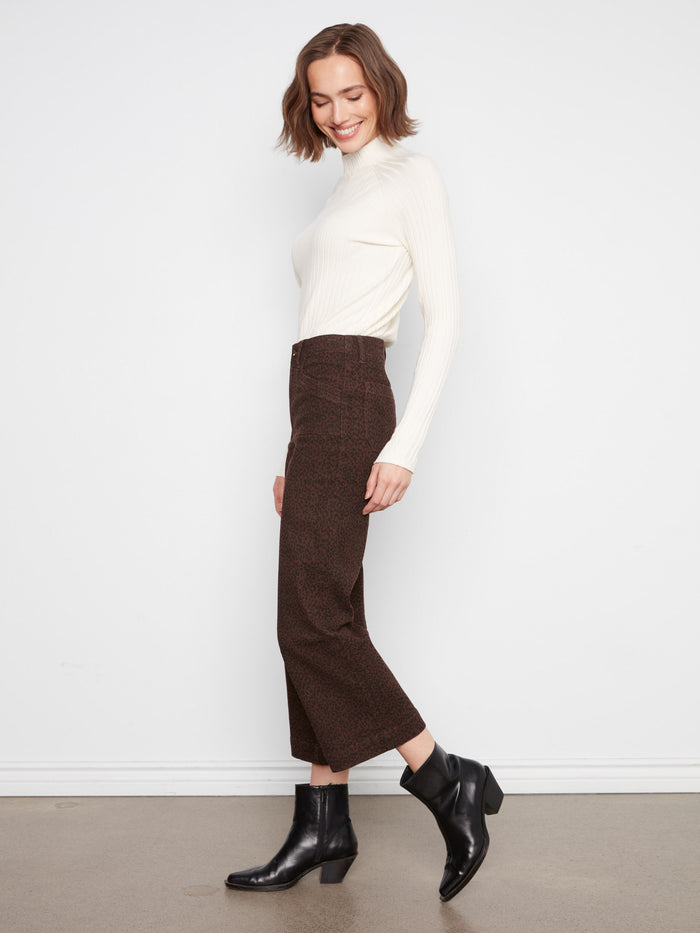Featuring rectangular patch pockets, these pants blend practicality with modern design. By Charlie B.