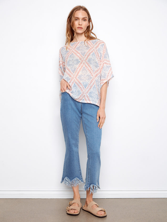 Crafted from a lightweight cotton blend, this top is perfect for comfortable wear. By Charlie B.