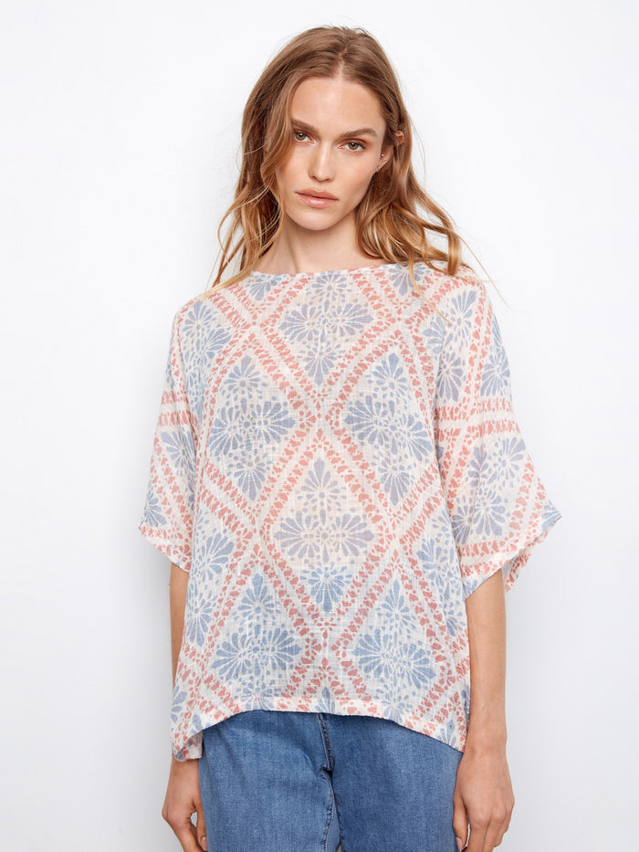 With elbow-length dolman sleeves, this top provides a relaxed and stylish look. By Charlie B.