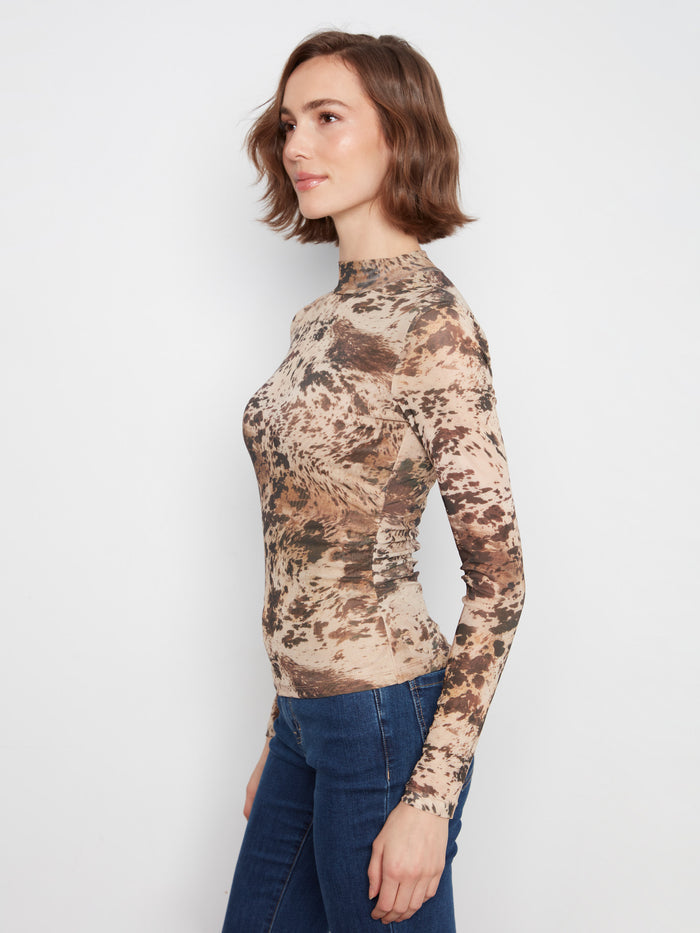 The body-lined design of this top ensures coverage while maintaining a sleek look with its slim fit. By Charlie B.