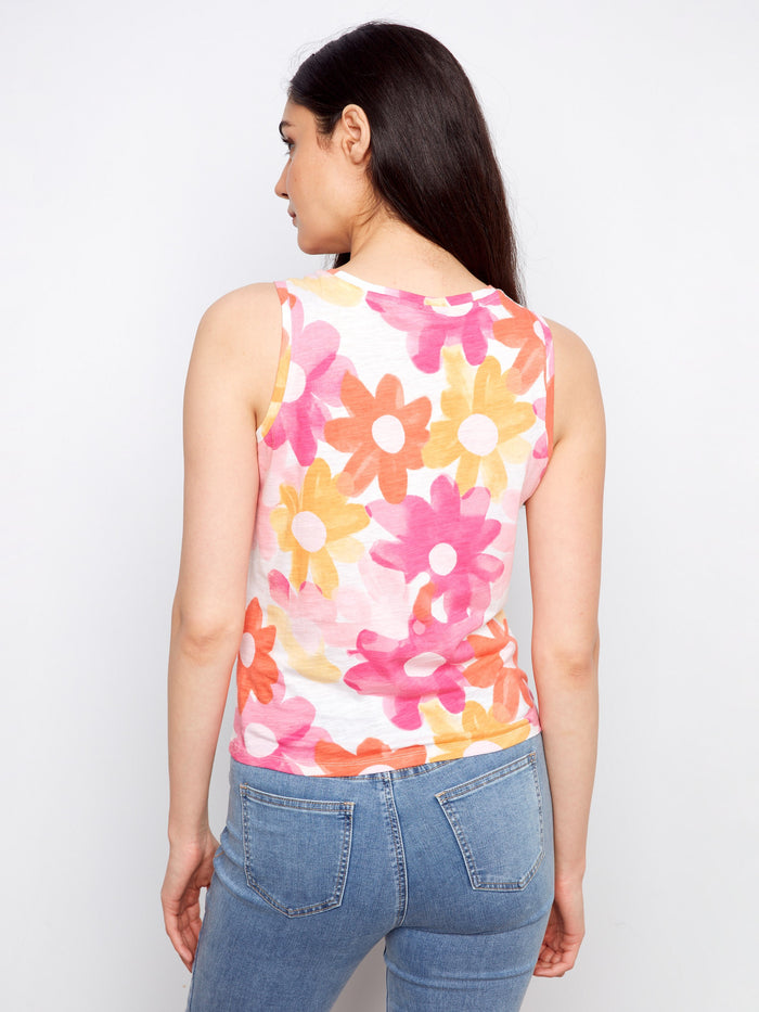 Chic sleeveless floral tank top crafted from 100% cotton showcasing bright pink, orange, and yellow flowers by Charlie B.