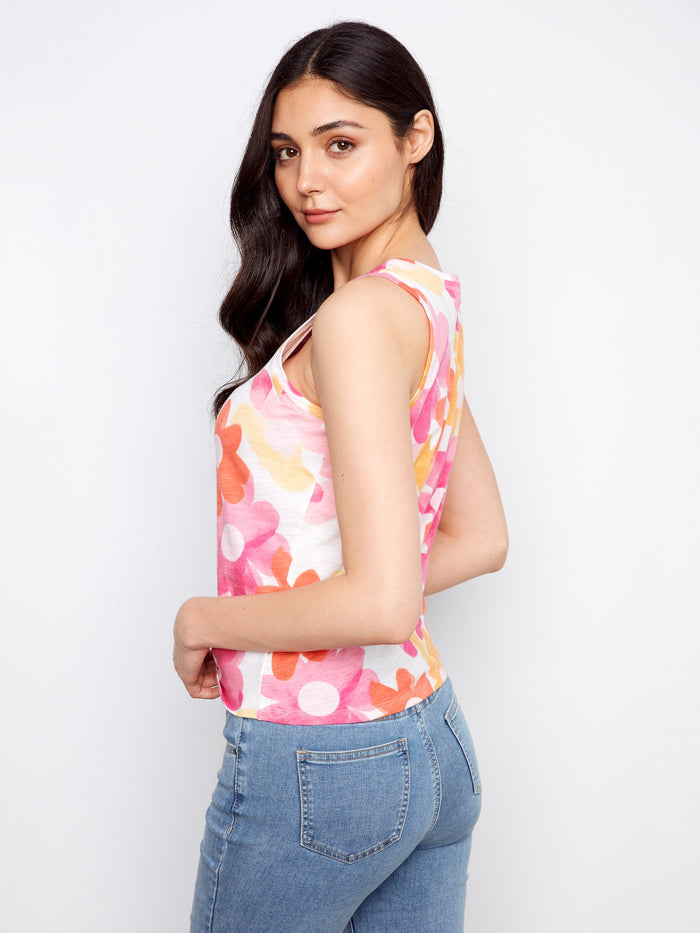 Stylish floral tank top in lively colors of pink, orange, and yellow with a comfortable crew neckline by Charlie B.