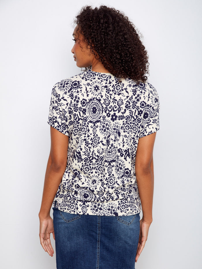 Chic top with detailed print and comfortable fit, designed with attention to every detail. By Charlie B.