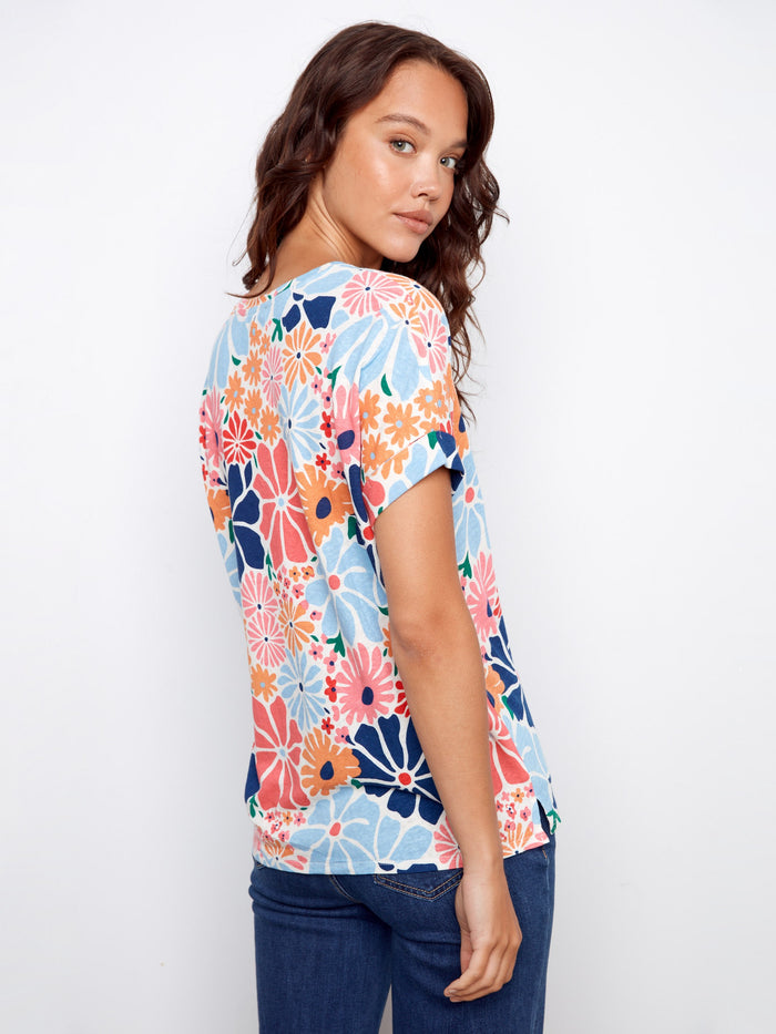 Vibrant floral design on a linen blend fabric, enhancing the relaxed fit of this t-shirt by Charlie B.