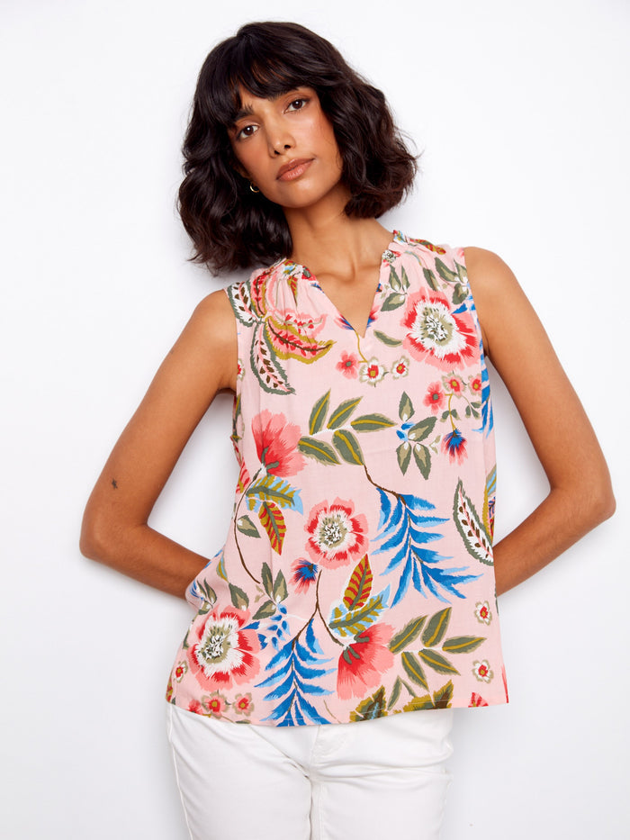 Floral top with ruffled neckline adds a touch of elegance to your summer wardrobe by Charlie B.