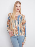 Knit top with a V-neckline, showcasing an abstract pattern in earthy and blue tones, perfect for casual wear by Charlie B.