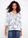 Elegant V-neck top with a stunning placement print design, perfect for any occasion. Features 3/4 sleeves by Charlie B.