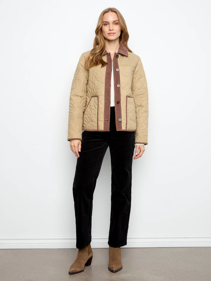 This jacket showcases a classic corduroy shirt collar, adding sophistication to your wardrobe. Designed by Charlie B.