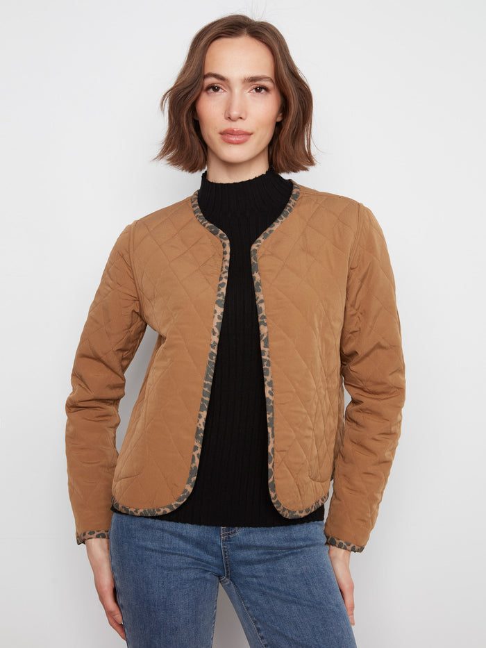 Quilted design jacket with edge binding detail, offering a sophisticated look and feel. By Charlie B.