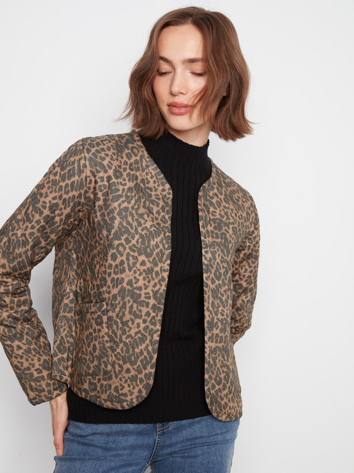 Stylish leopard print jacket crafted with a unique quilted design for added texture and warmth. By Charlie B.