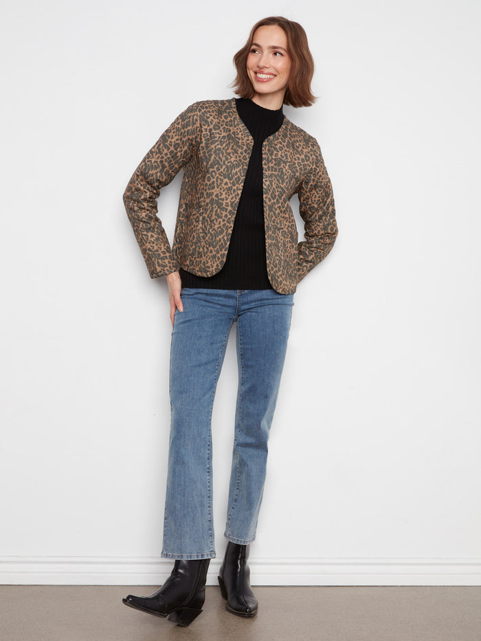 Versatile reversible jacket featuring edge binding detail that adds a touch of elegance to your outfit. By Charlie B.