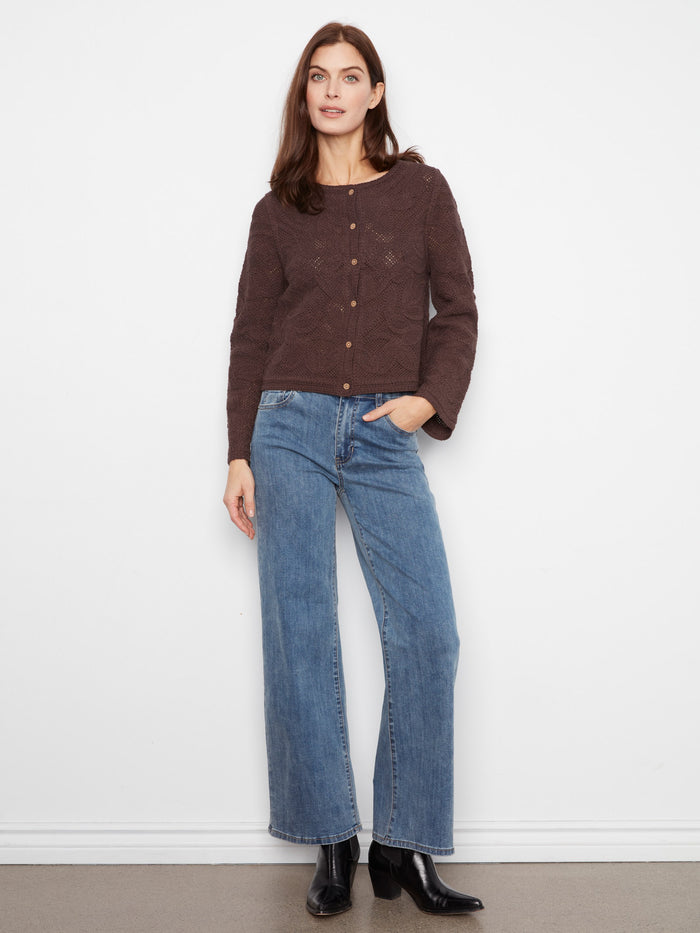 Button-down front adds a touch of elegance to this cozy 100% cotton sweater, ideal for layering by Charlie B.