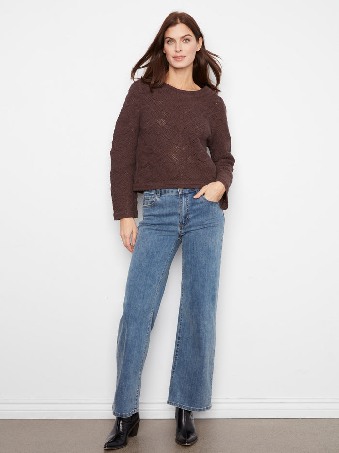 Enjoy the comfort and warmth of long sleeves in this beautifully knitted 100% cotton sweater by Charlie B.