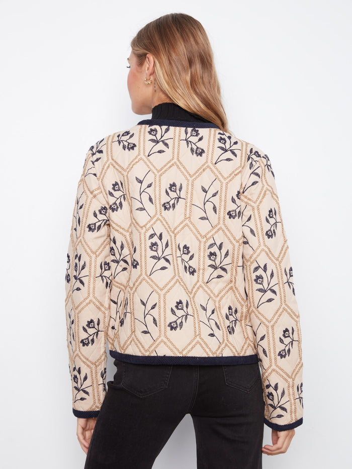 Edge binding detail enhances the sophisticated appeal of this versatile outerwear option from Charlie B.
