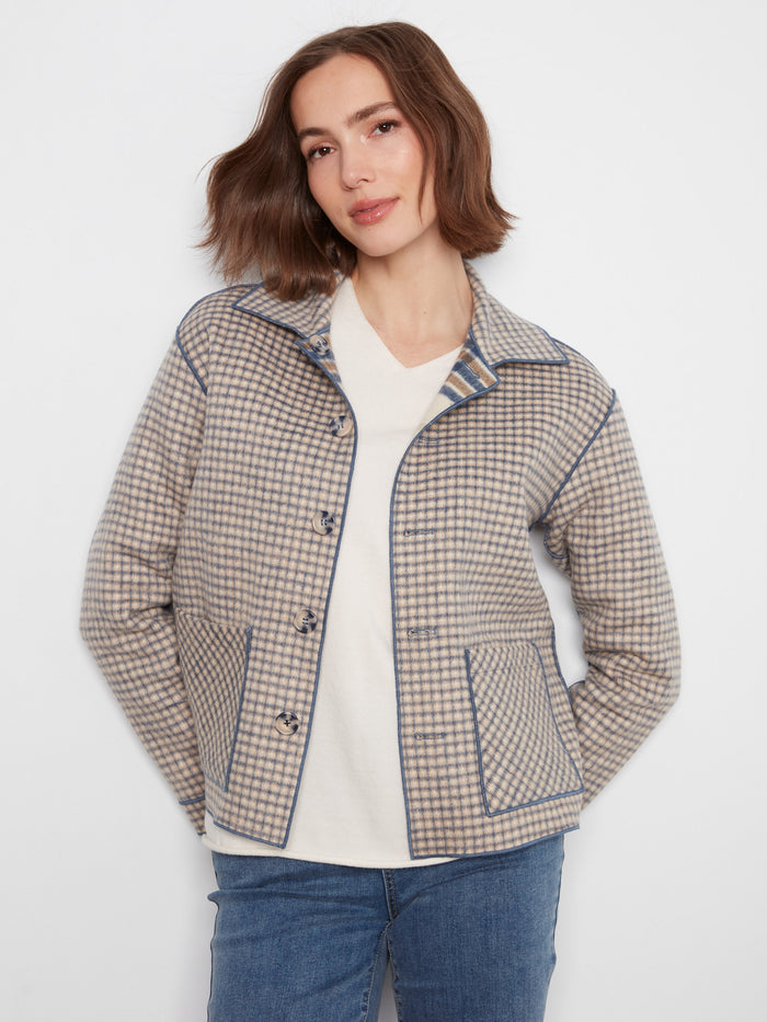 Chic reversible jacket with button-front closure adds a stylish touch to any outfit. By Charlie B.
