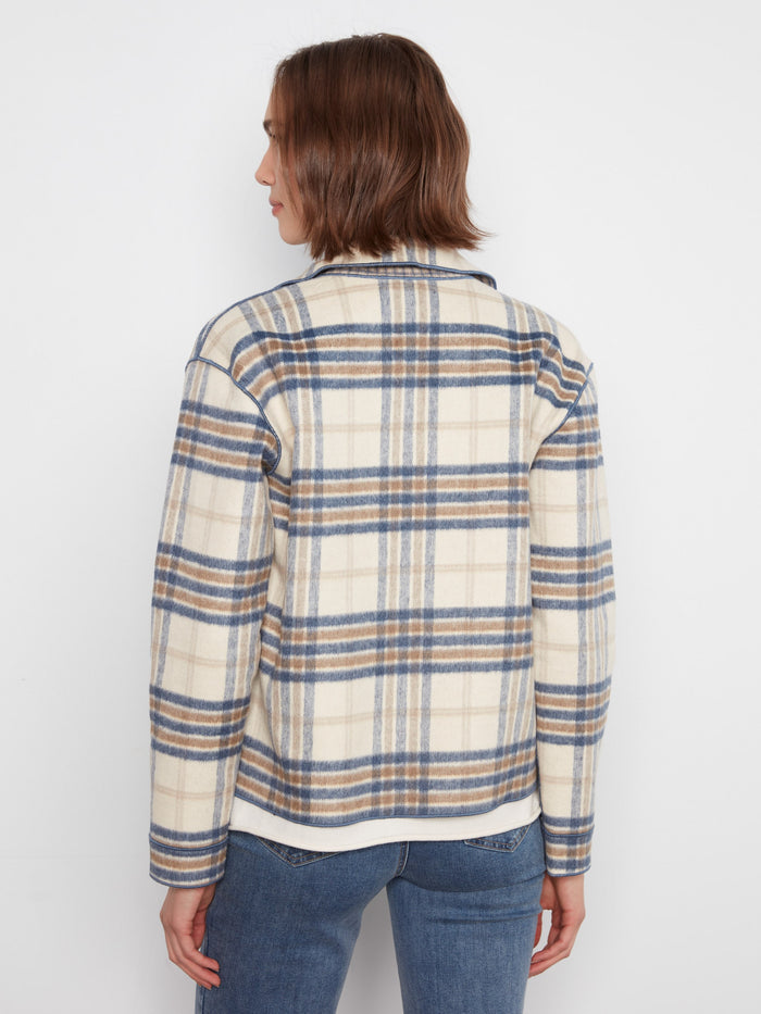 Stylish plaid pattern with button-front closure offers easy wearability and charm. By Charlie B.