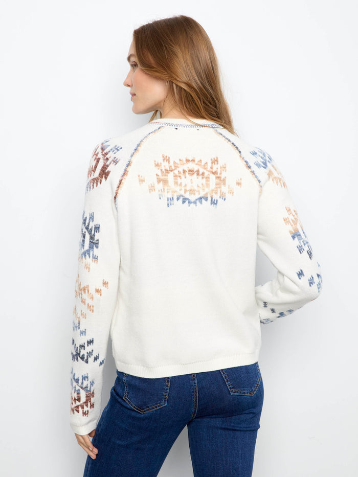 Raglan sleeves enhance the fit of this stylish sweater, offering both comfort and flexibility. By Charlie B.