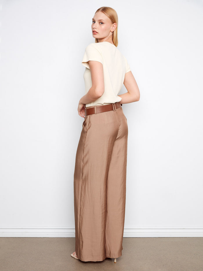 Designed with a regular rise, these pants provide classic comfort and style effortlessly. By Charlie B.
