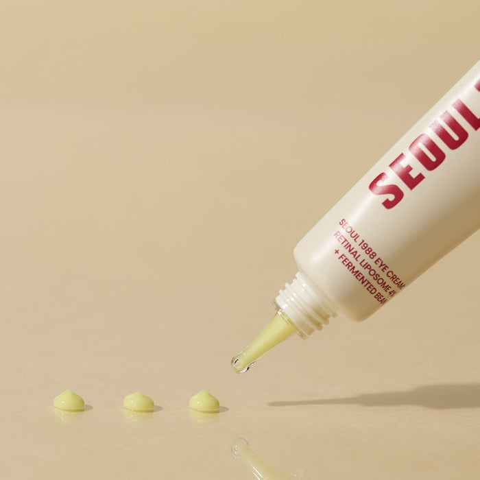 SEOUL 1988 Retinal Fermented Soybean Eye Cream tube dispensing product on a smooth surface