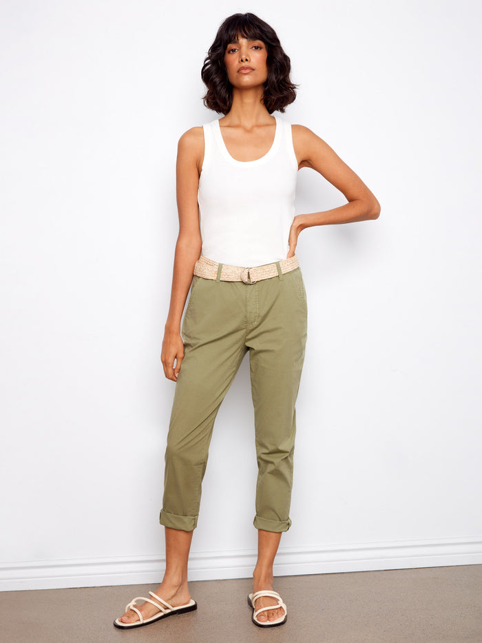 These pants feature a slim fit design, perfect for a sleek look by Charlie B.