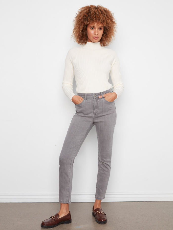 Smoke grey slim leg jeans featuring a zip fly and button closure, made from stretch denim by Charlie B.