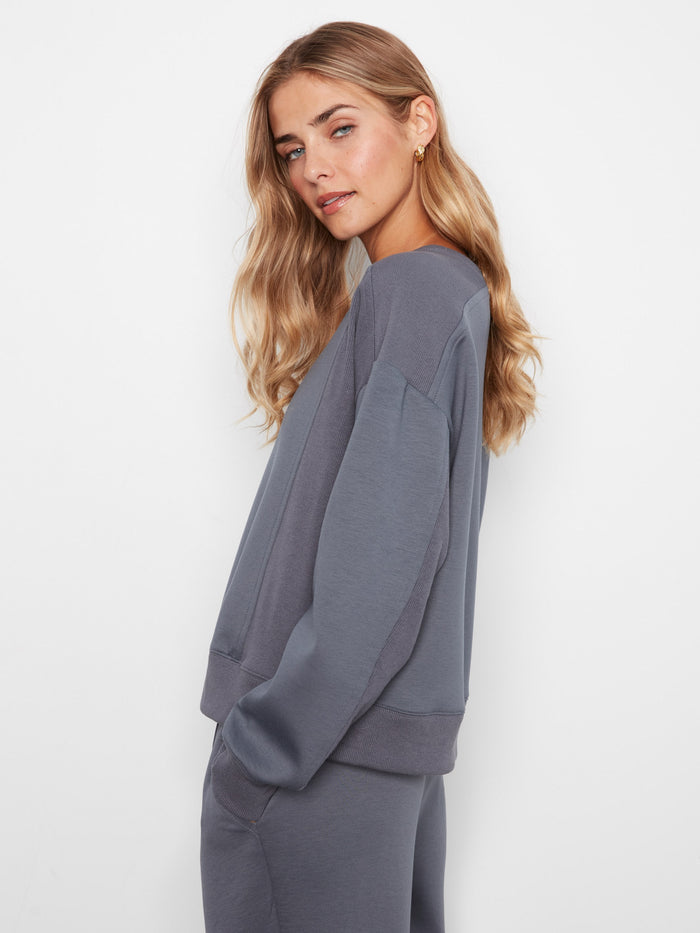 Ribbed side panels enhance the structure and style of this comfortable, relaxed fit sweatshirt by Charlie B.