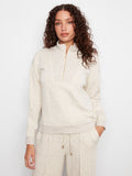 Soft scuba fabric creates a cozy feel in this stylish half-zip mock neck top, perfect for any casual occasion. By Charlie B.