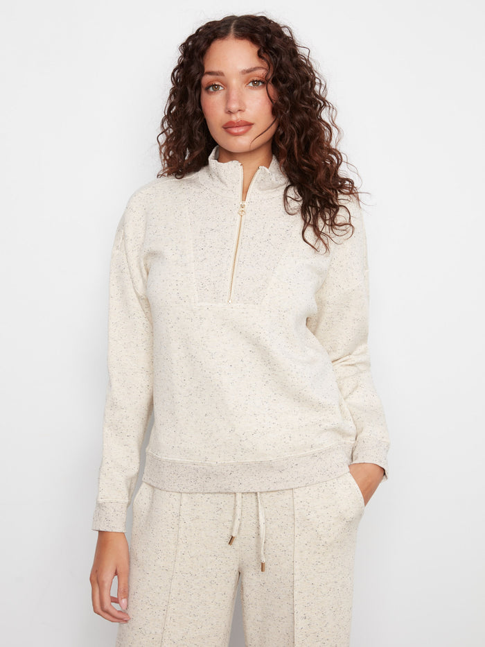 Soft scuba fabric creates a cozy feel in this stylish half-zip mock neck top, perfect for any casual occasion. By Charlie B.