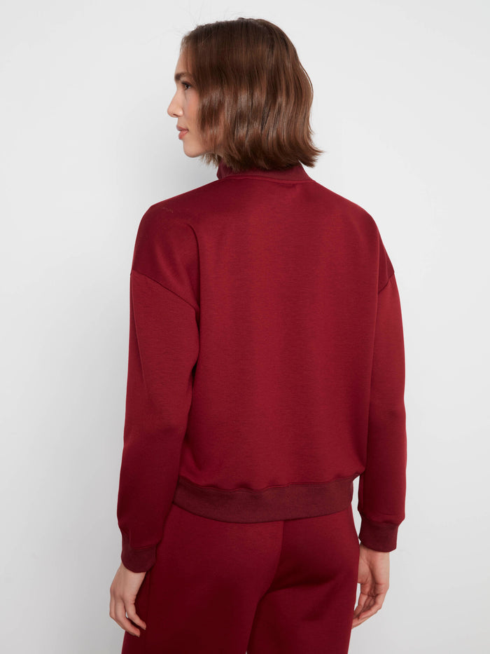 Relaxed fit merlot sweatshirt with ribbed details at the cuffs and hem for added texture by Charlie B.