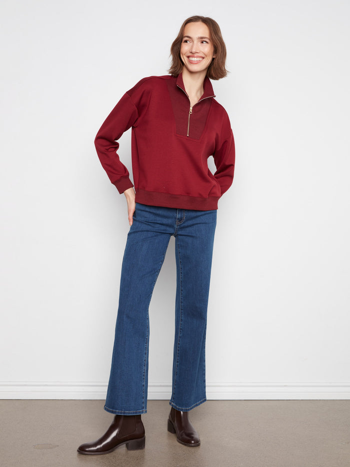 Long sleeves on this brown half-zip provide warmth while maintaining a casual look by Charlie B.