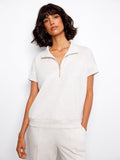 Light grey top with a stylish half-zip feature, perfect for casual outings. The short sleeves add comfort and ease by Charlie B.