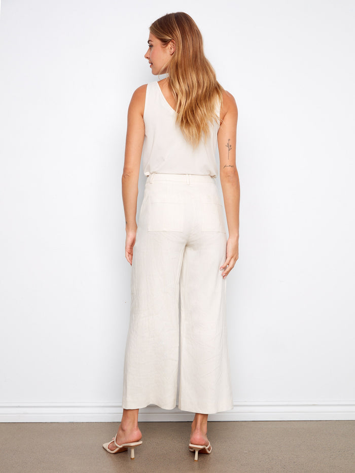 Designed with patch pockets, these pants combine functionality with fashion-forward style by Charlie B.