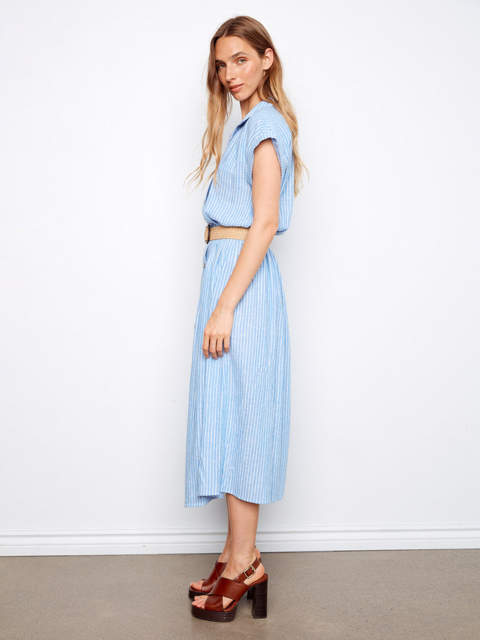 Featuring hidden pockets, this maxi length dress combines functionality with fashion. By Charlie B.