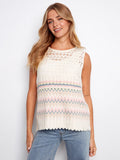 Crochet top with a crew neckline and multicolor stripes, ideal for warm days. Crafted for comfort and style by Charlie B.