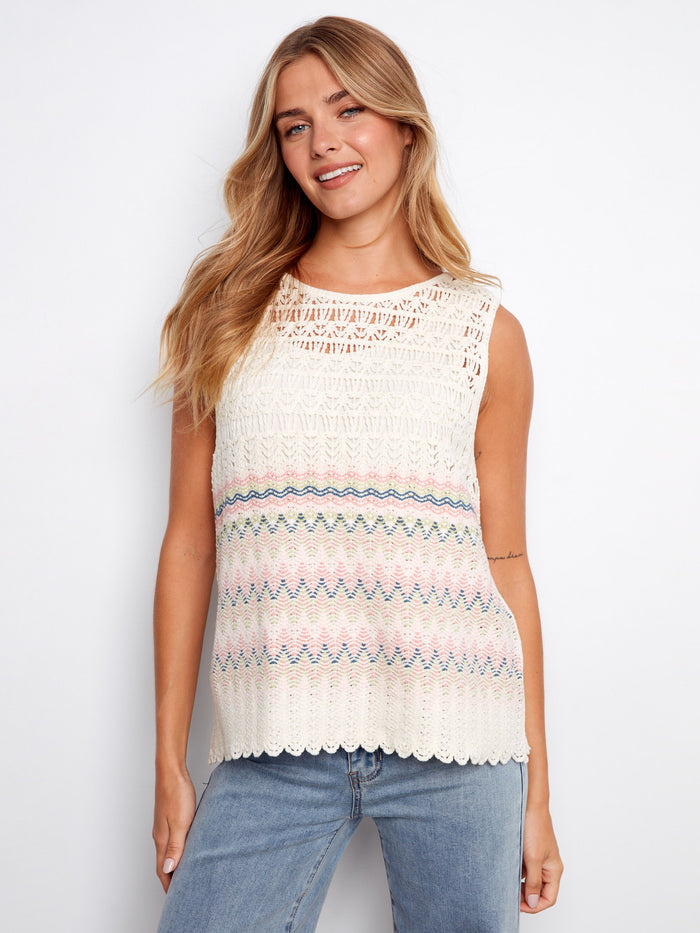 Crochet top with a crew neckline and multicolor stripes, ideal for warm days. Crafted for comfort and style by Charlie B.
