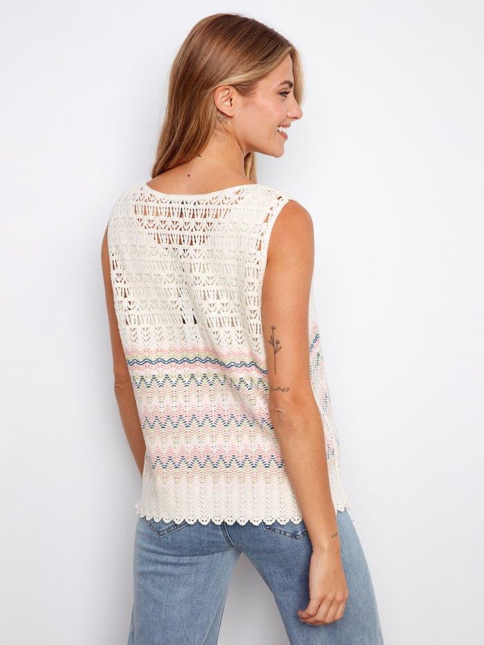 Elevate your wardrobe with this crochet top showcasing a crew neckline and intricate patterns for a chic look by Charlie B.