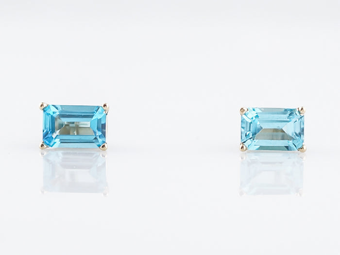 Stud Earrings Modern 1.33 Emerald Cut Blue Topaz in 14k Yellow Gold