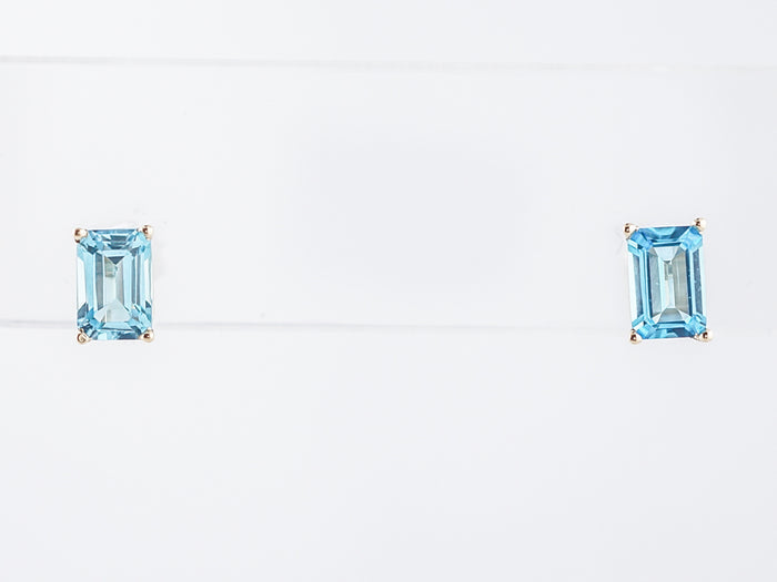 Stud Earrings Modern 1.33 Emerald Cut Blue Topaz in 14k Yellow Gold