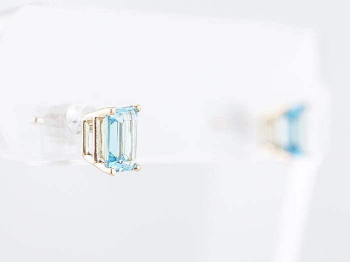 Stud Earrings Modern 1.33 Emerald Cut Blue Topaz in 14k Yellow Gold