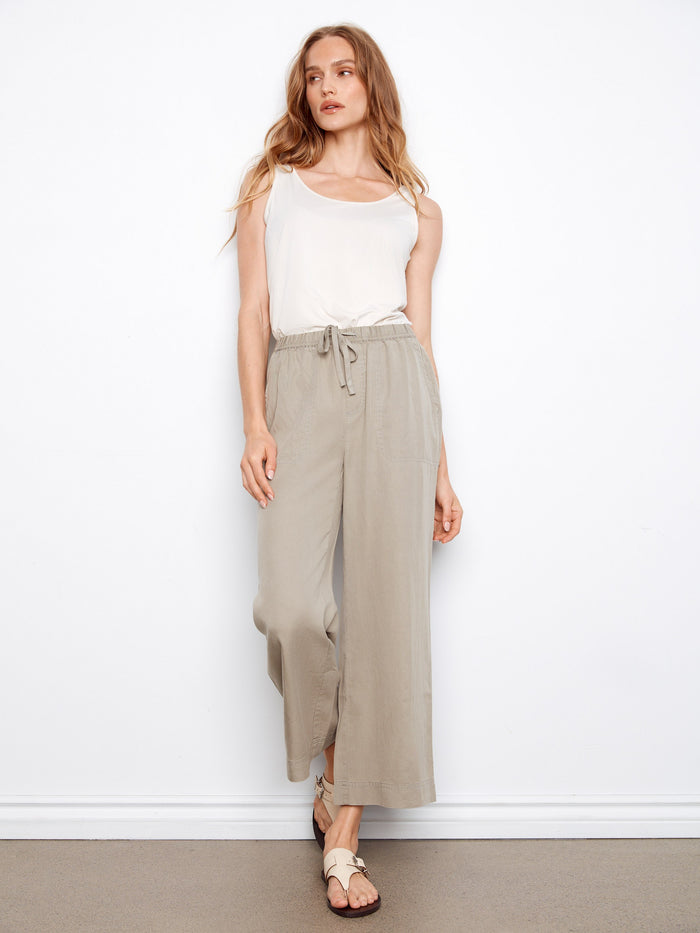 Elastic waistband ensures a snug fit while maintaining comfort and ease of movement. By Charlie B.