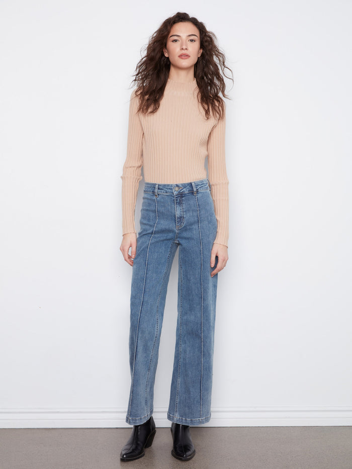 Denim jeans featuring an extra-wide leg for a relaxed fit, perfect for all-day comfort. By Charlie B.