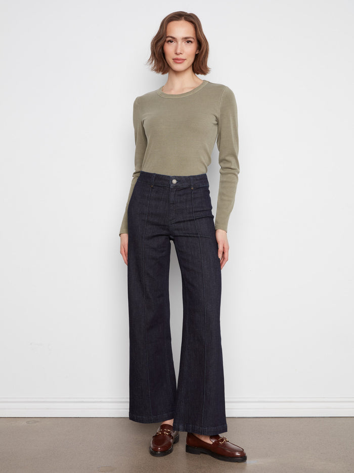 These jeans feature an extra-wide leg design, offering a chic and modern look by Charlie B.