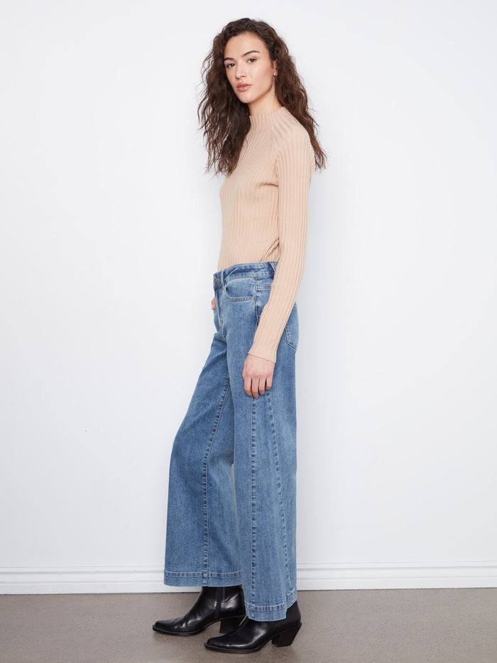 Side panel detail enhances the chic look of these wide leg jeans by Charlie B.
