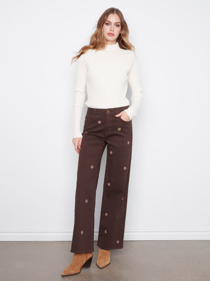 Brown wide-leg pants with a full-length cut and delicate floral embroidery, crafted from stretch twill fabric by Charlie B.