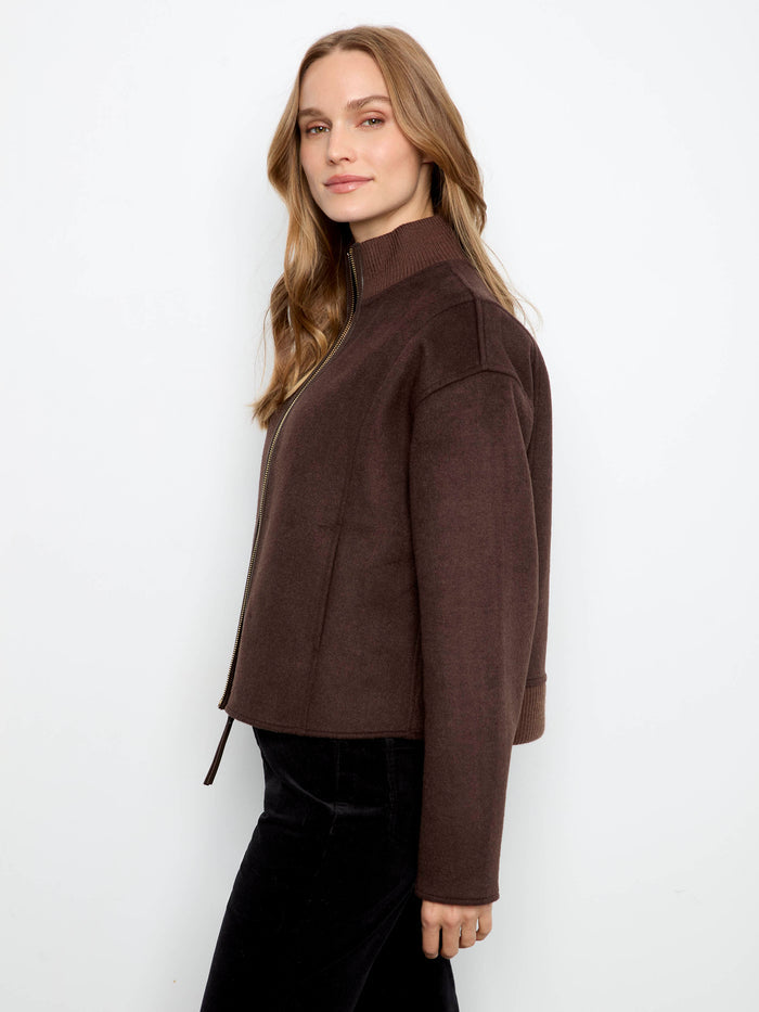 Featuring practical slash pockets, this jacket combines style and functionality effortlessly. Crafted in a premium wool blend by Charlie B.